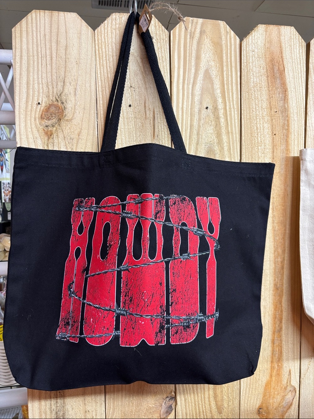 Black Tote Bag with Red 'Howdy' Graphic